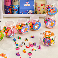 Close-up of animal and fruit mini erasers