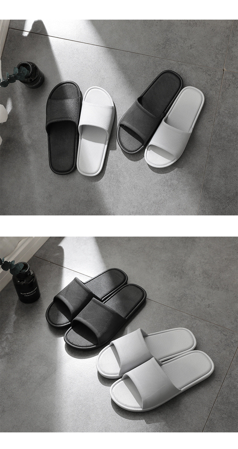 Stylish unisex slippers on a white background