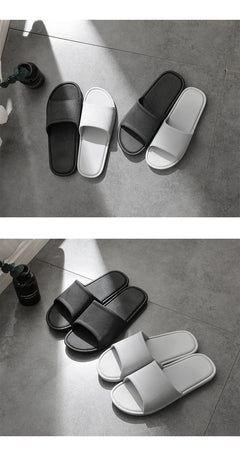 Stylish unisex slippers on a white background