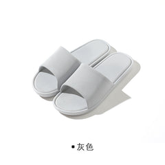 Stylish unisex slippers on a white background