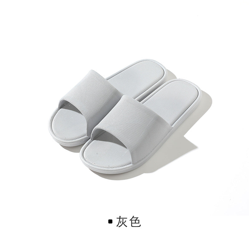 Stylish unisex slippers on a white background