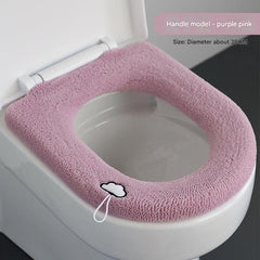 Plush toilet seat cover showcasing pink design