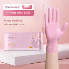 Stack of nitrile cleaning gloves in pink