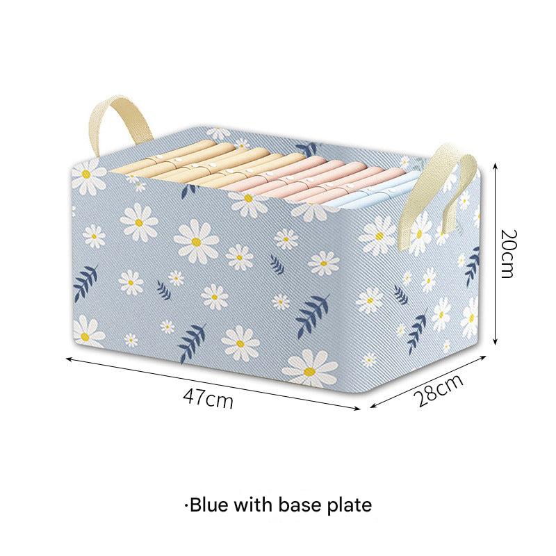 Large beige fabric storage box with items