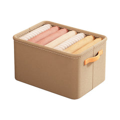 Small transparent PVC organiser on shelf