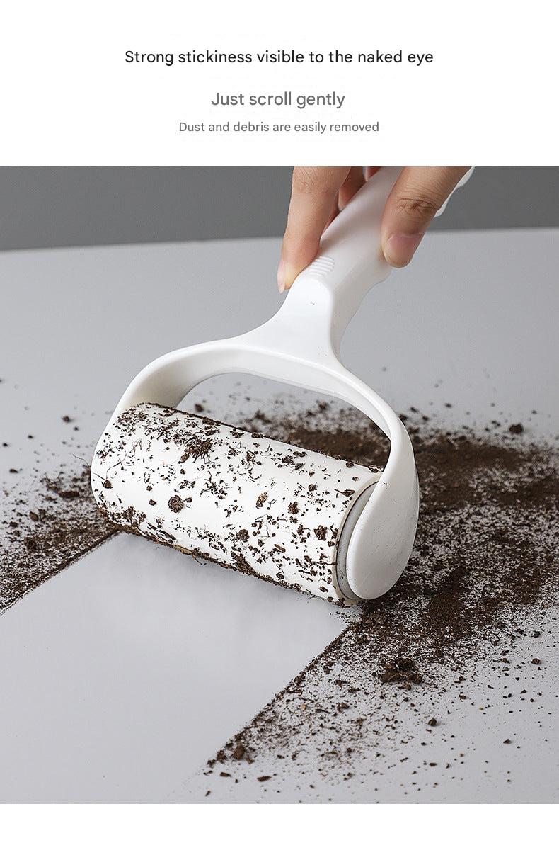 easy grip gray lint roller in hand