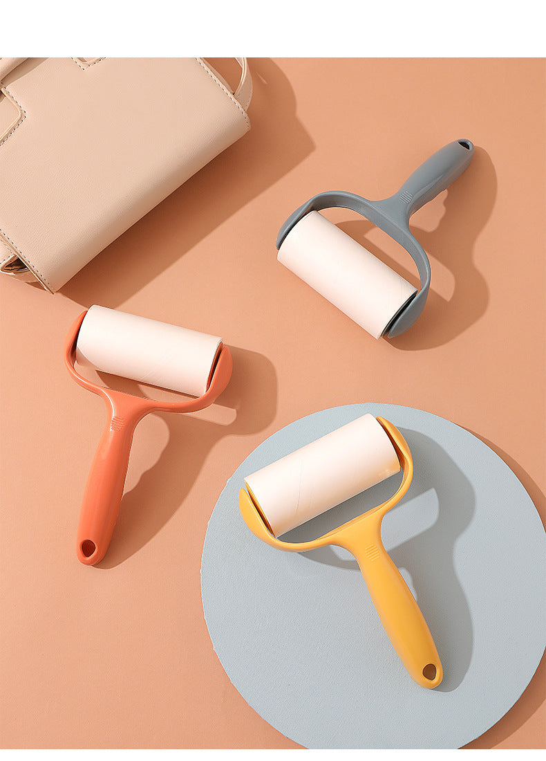 pink lint roller showing lint removal