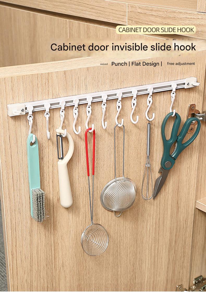 Utility rack showcasing kitchen utensils