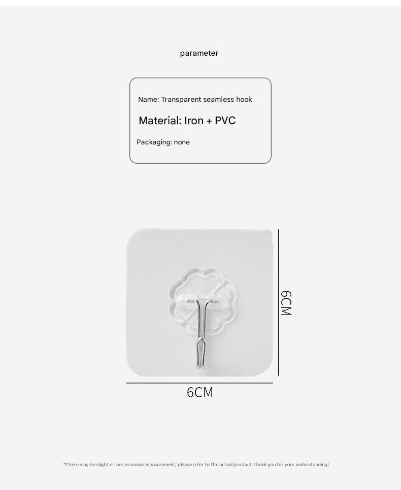 Different sizes of adhesive hooks on a white background