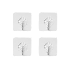 Different sizes of adhesive hooks on a white background