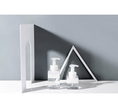 Foam soap dispenser in bathroom image 10