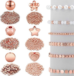 Close-up of luxury spacer beads assortment in gold, silver, and rose gold