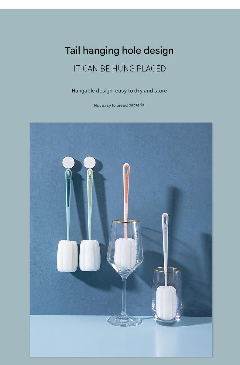 Different colours of long-handle sponge brushes displayed