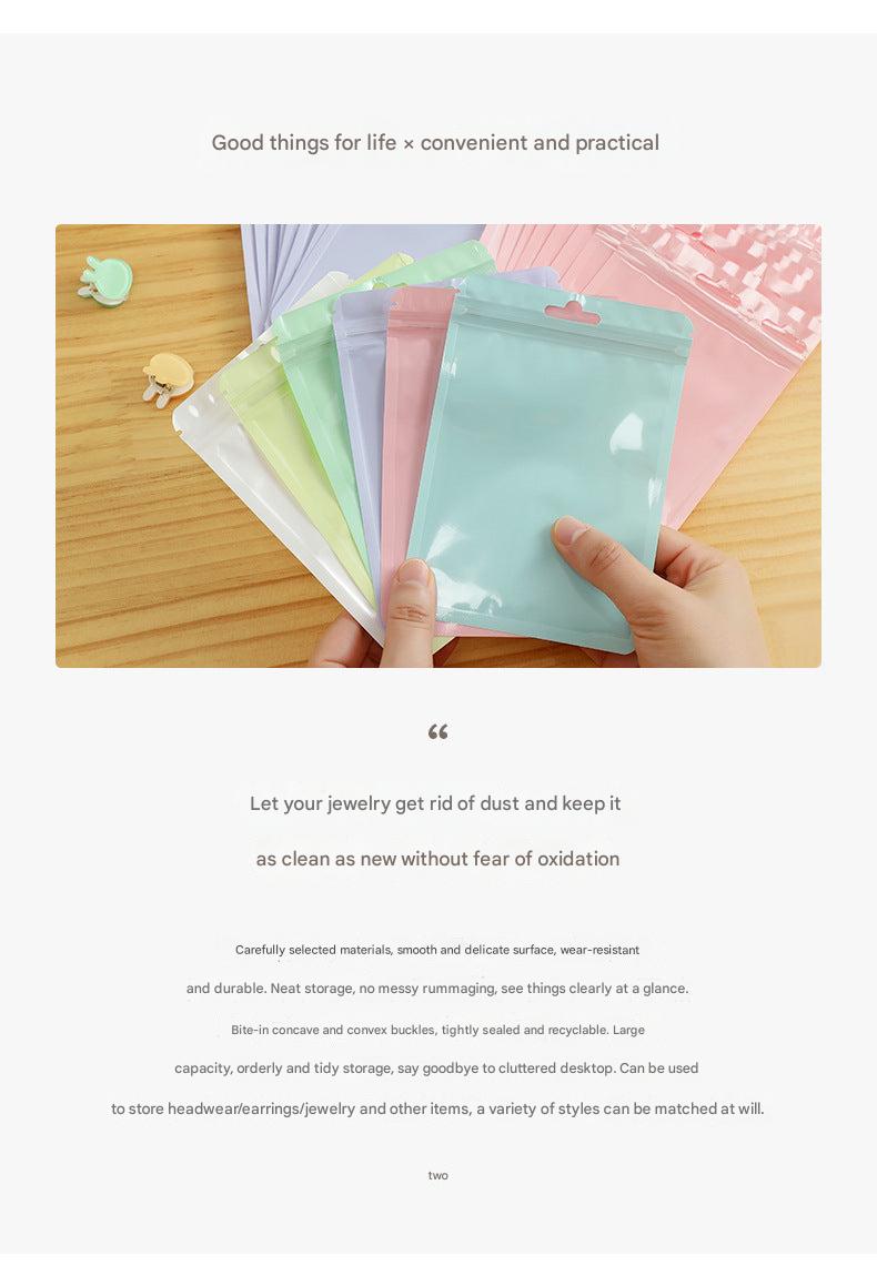 various macaron coloured bags stacked neatly