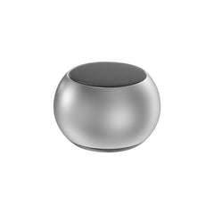 Mini Bluetooth Speaker in use at a desktop setup