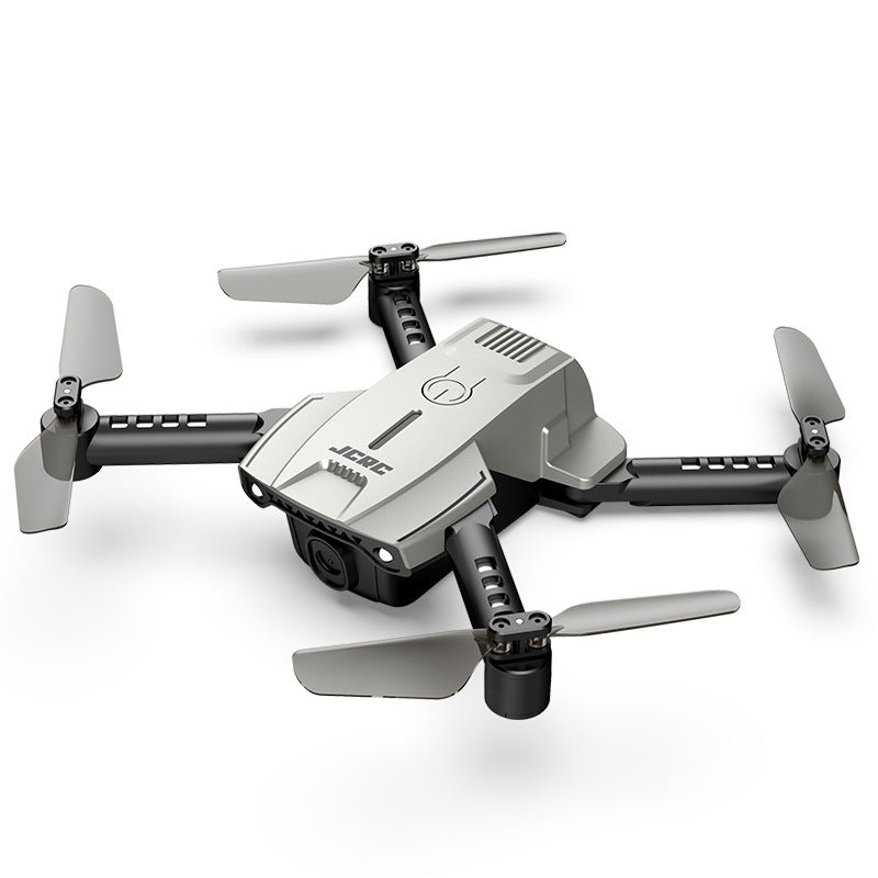 Family enjoying remote control flying with mini drone