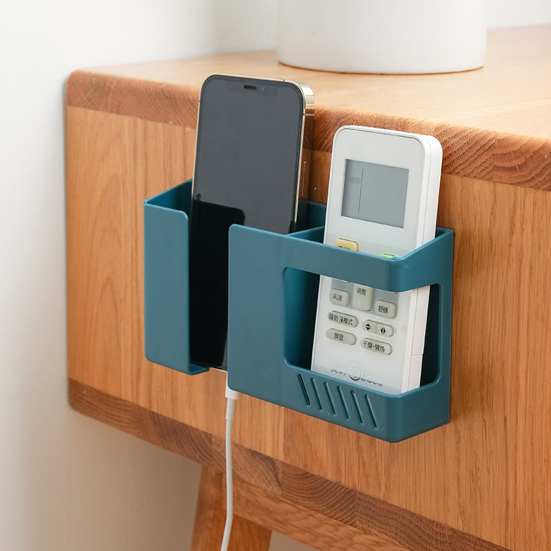 Organiser installed on a wall with remote controls