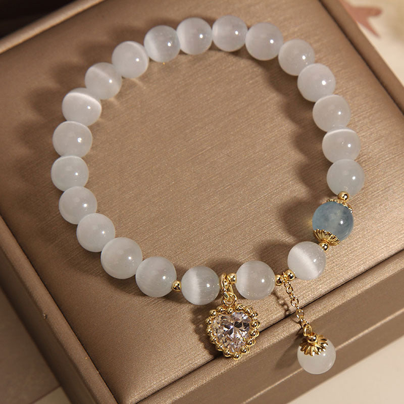 Beautifully packaged heart pendant cat eye stone bracelet