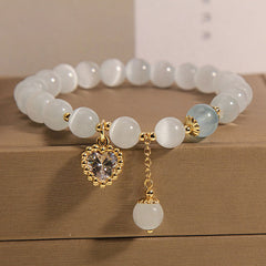 Detail image showing the heart pendant on bracelet