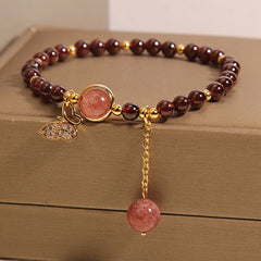 Close-up image of the butterfly charm bracelet
