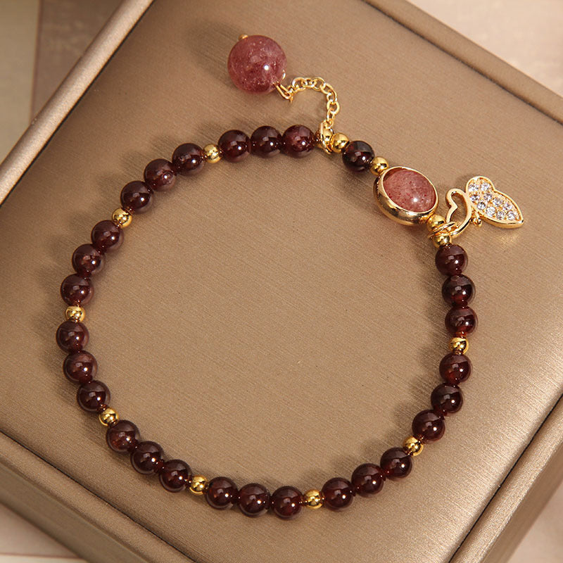 Stylish garnet bracelet worn by a model