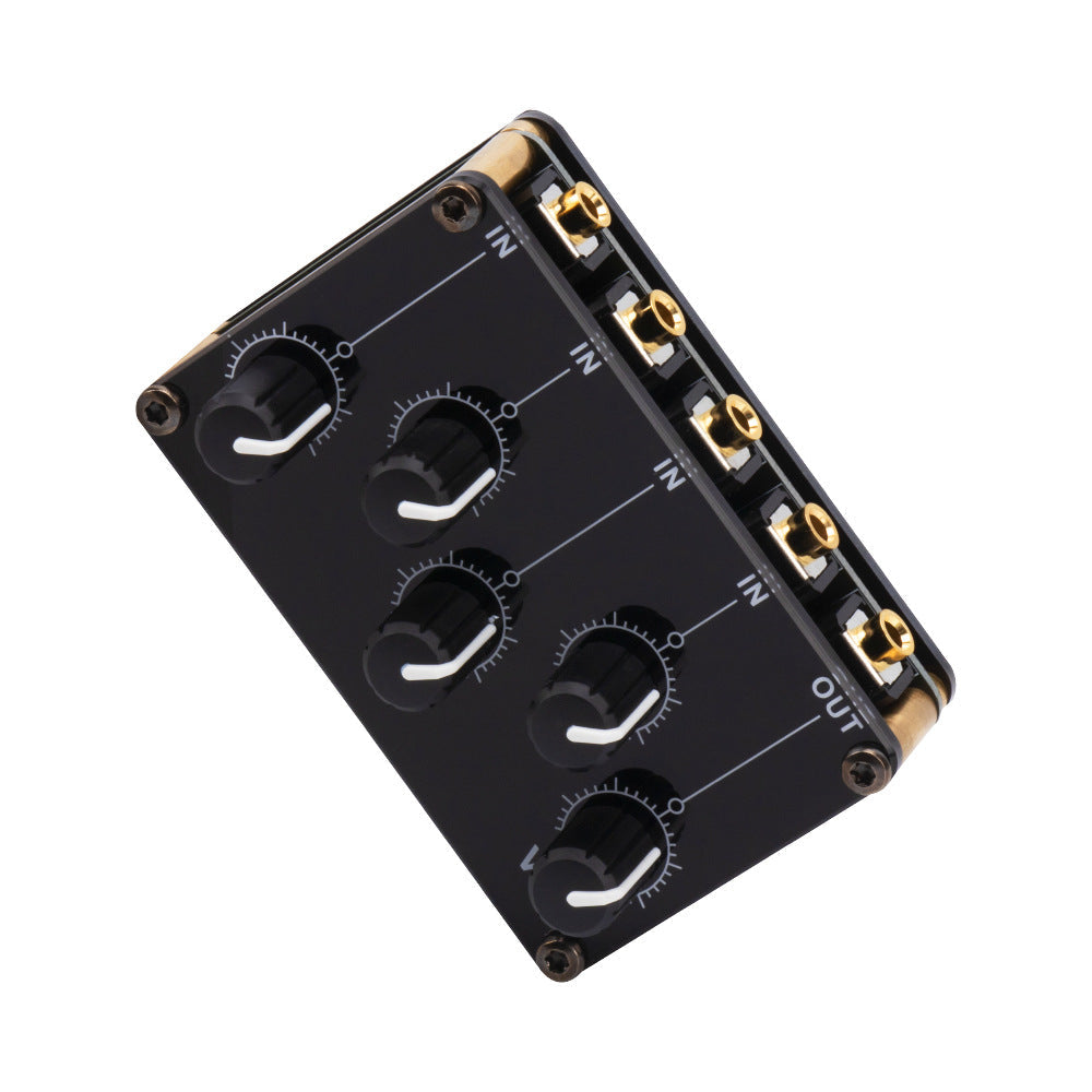 Compact audio mixer on a table for portable use