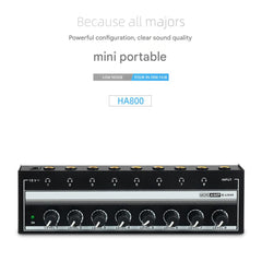 User adjusting controls on HA800 headphone amplifier