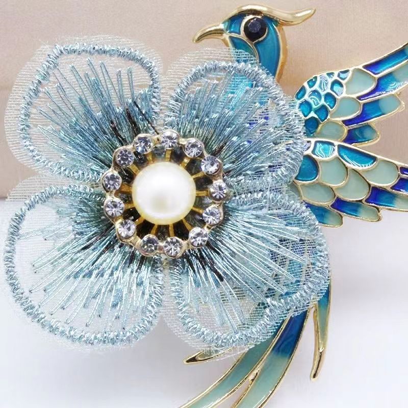 Vintage handmade embroidered floral brooch front view