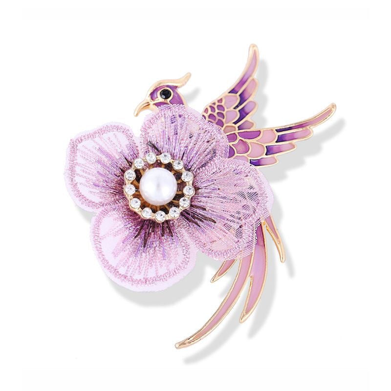 Close-up of charming animal design on brooch