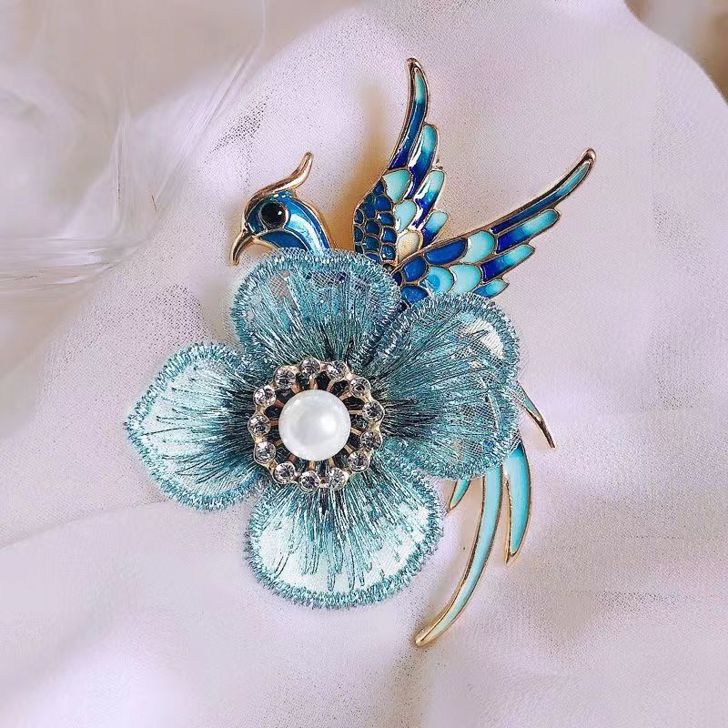 Brooch pinned to a casual outfit for stylish look