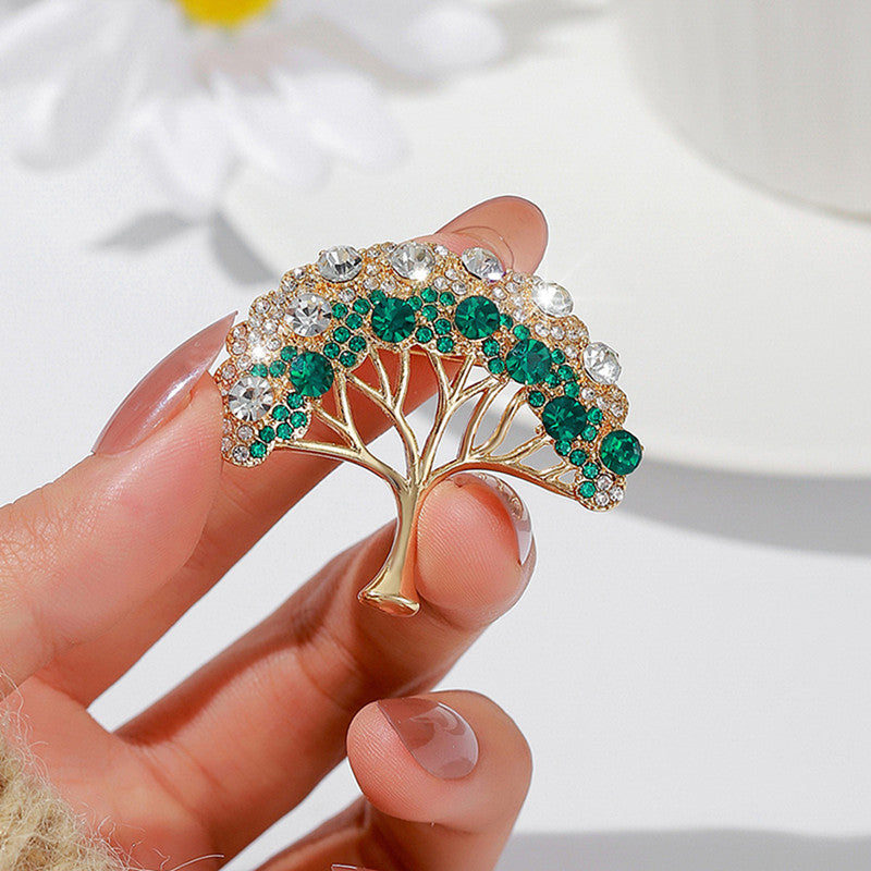 Stylish zinc alloy brooch against a plain background