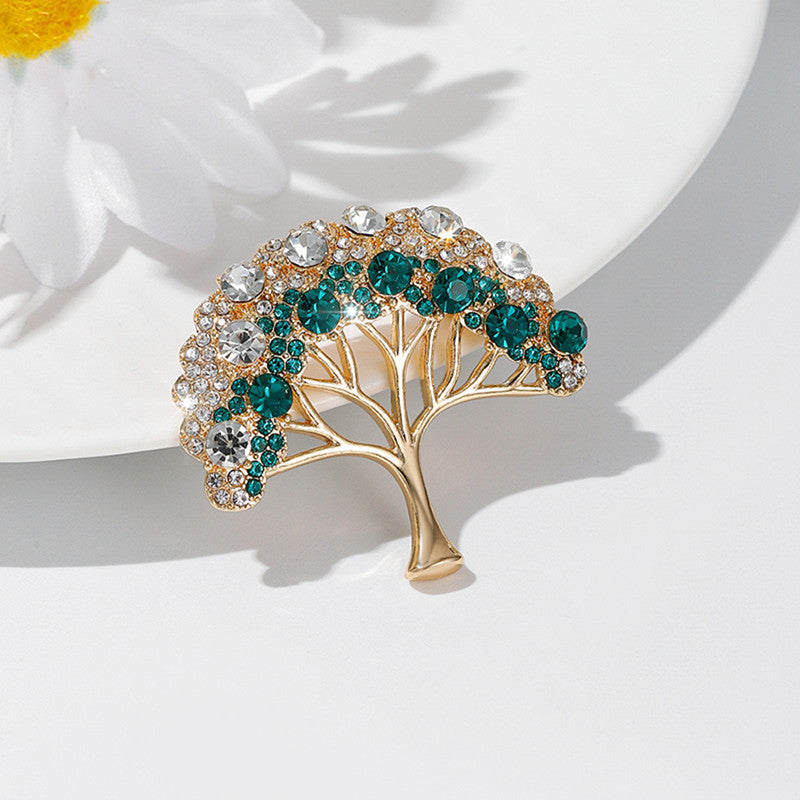 Flat lay of lucky tree brooch