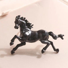 Close-up of vintage horse brooch design