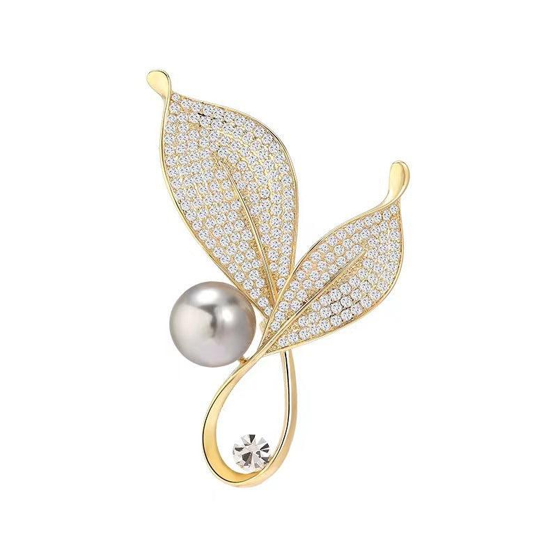 Close-Up of Leaf Design Brooch with Zircon Stones - Image 2