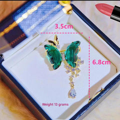 Close-up of butterfly brooch showcasing shimmering zircon stones