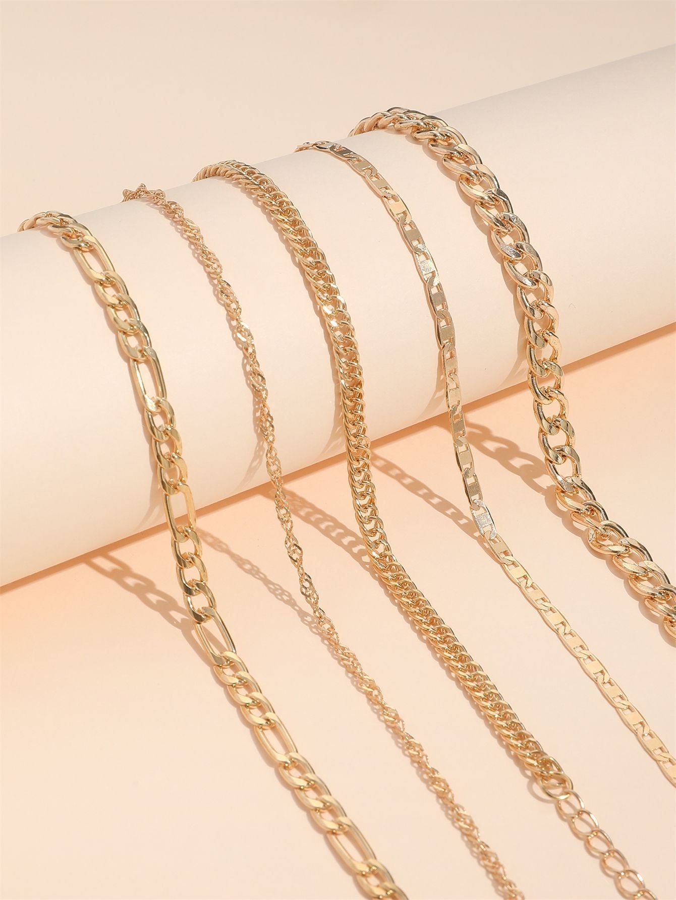 Close-up of minimalist snake chain anklet for women