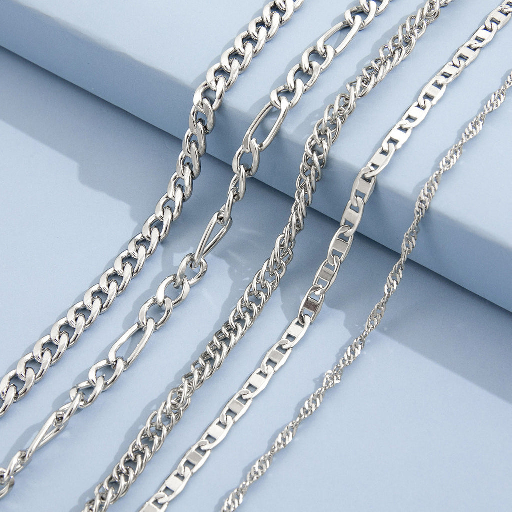 Stylish vintage anklet set displayed on a stand