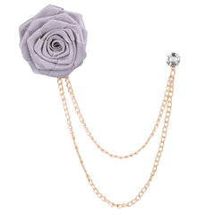 Elegant floral brooch on a wooden background