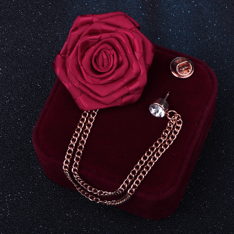 Color variants of floral brooches displayed neatly