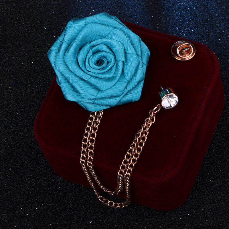 Elegant floral brooch on a wooden background