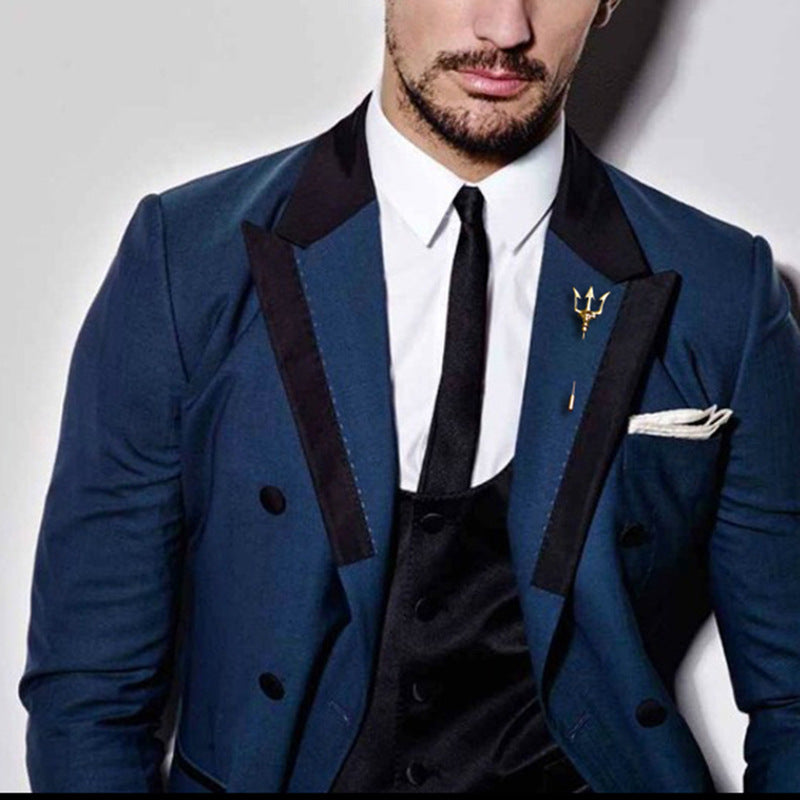 Close-up view of stylish trident lapel pin