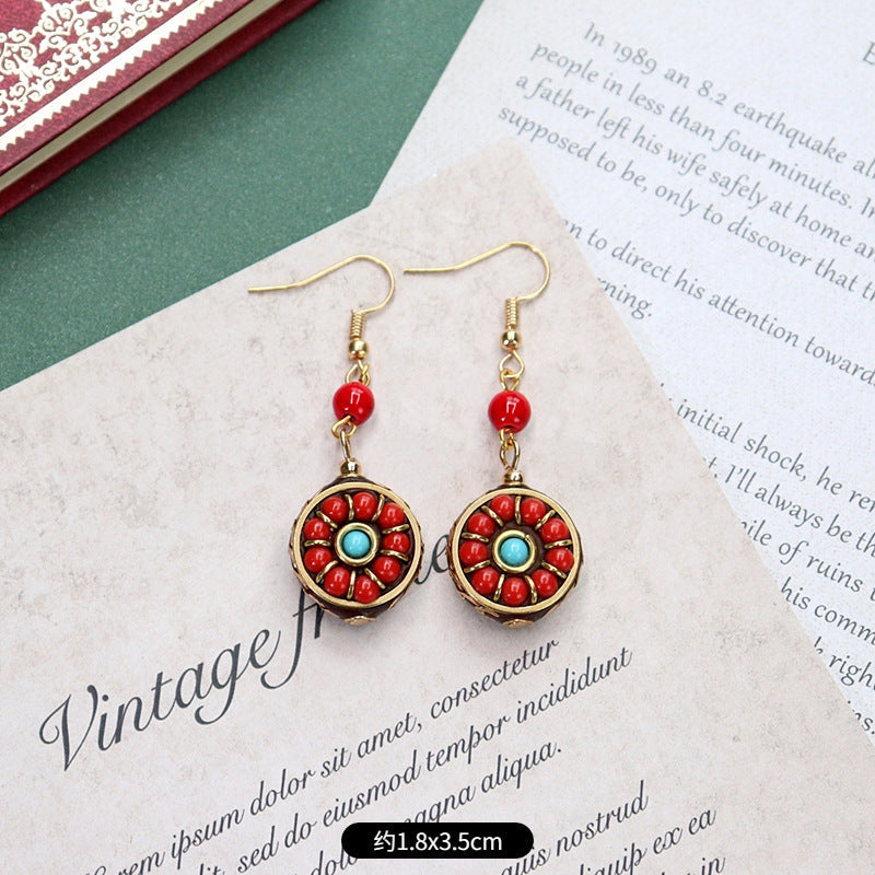 Detail shot of colourful bohemian earrings