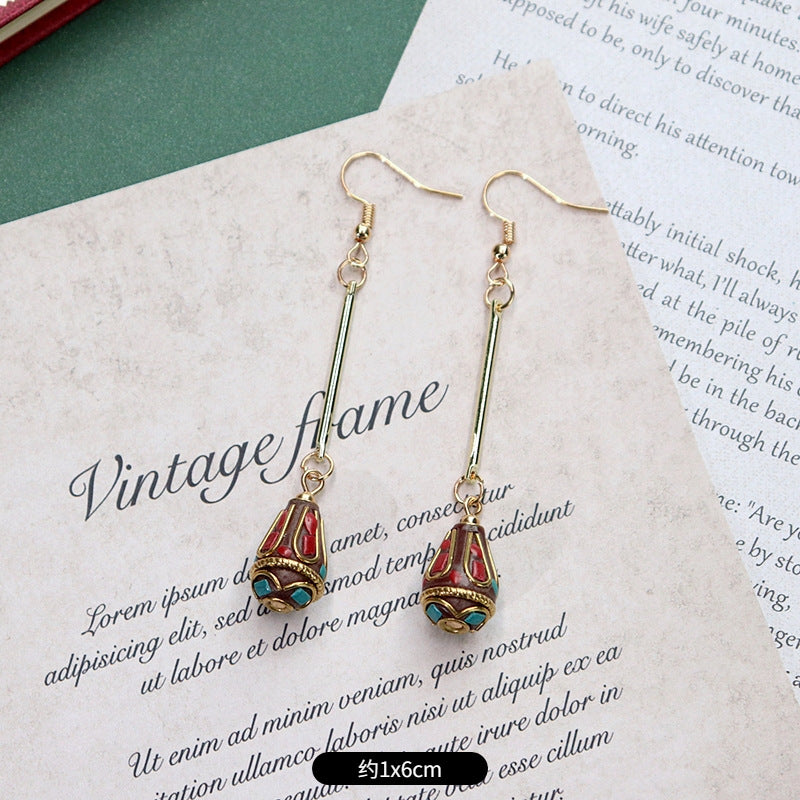 Colorful bohemian earrings showcasing Nepalese designs