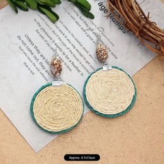 Close-up of Rattan Earrings on display