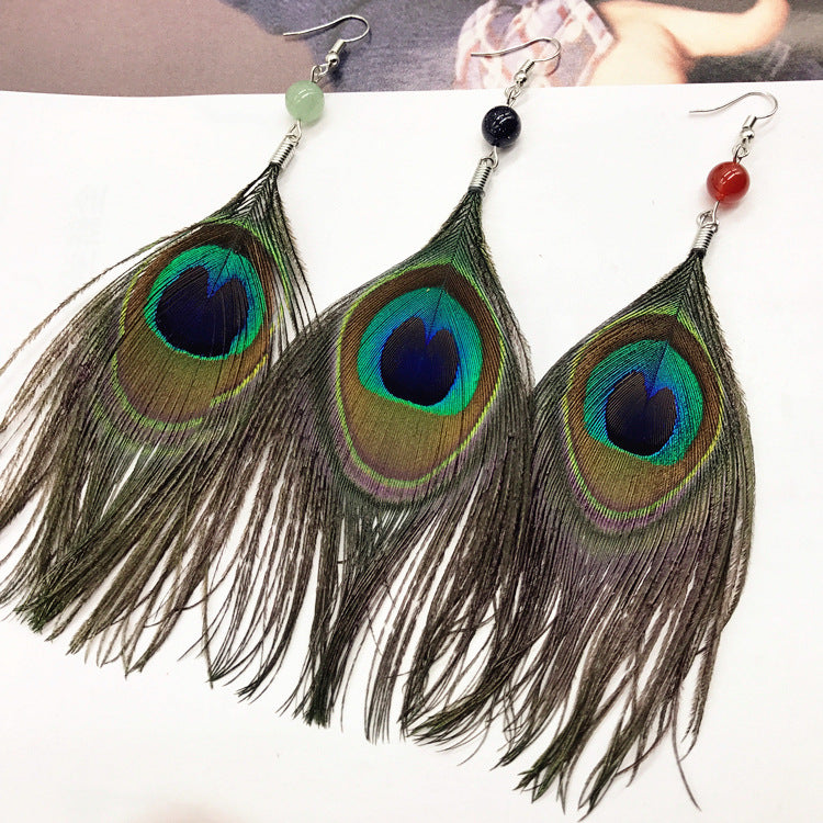 Peacock feather earrings with vibrant colours 1