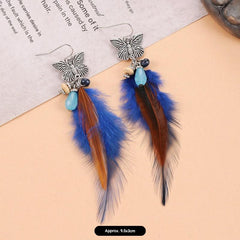 Artistic feather earrings on display image 8