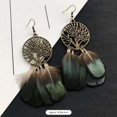 Artistic feather earrings on display image 8