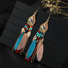 Bohemian feather tassel earrings in vibrant blue