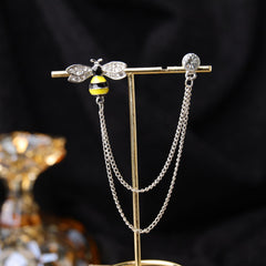 Necklace and brooch set on elegant display