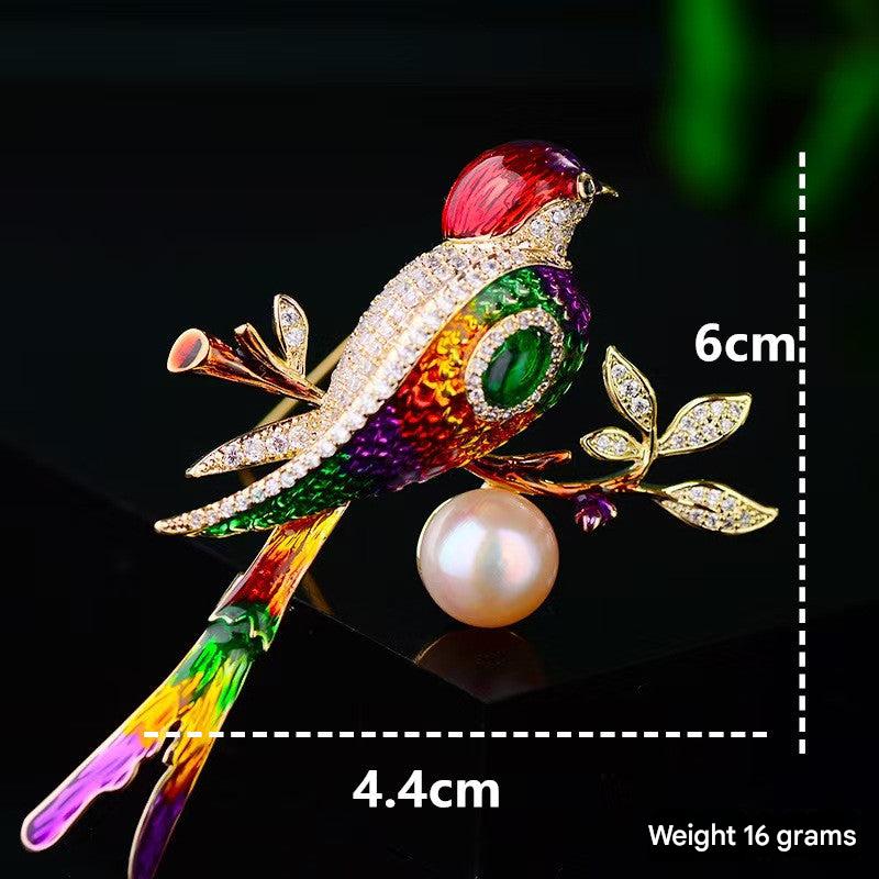 Detailed view of enamel finish on magpie brooch